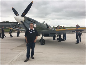 Volunteers are shown two spitfires at a local airfield