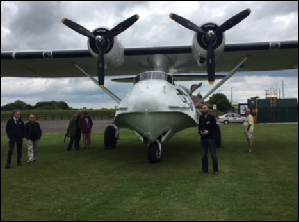 Volunteers are shown around Miss Pickup